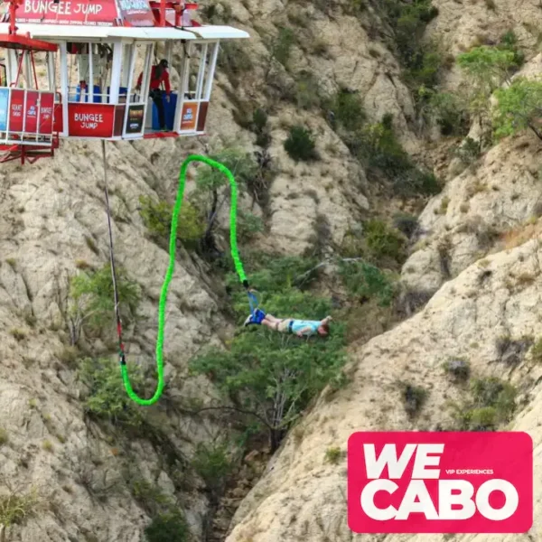 Image of a bungee jump from a glass-bottom gondola 300 feet above ground in Los Cabos, courtesy of WECABO.