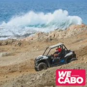 Image of a combo tour in Cabo San Lucas featuring a camel ride and RZR 4x4 adventure in desert landscapes, courtesy of WECABO.