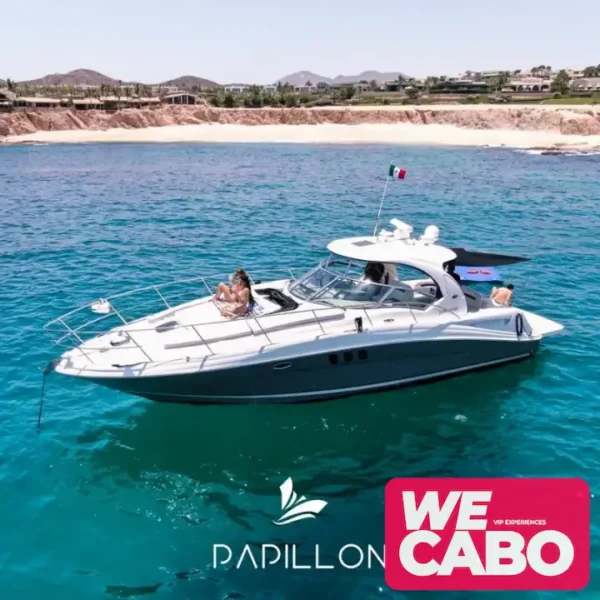 Image of a luxurious 45ft Sea Ray yacht cruising the crystal-clear waters of Cabo San Lucas, featuring spaces for relaxation, open bar, and gourmet menu.