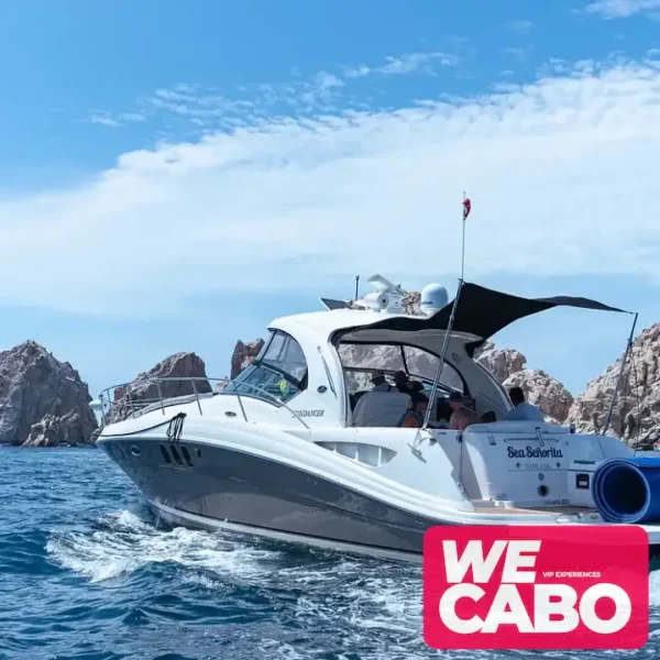 Image of a luxurious 45ft Sea Ray yacht cruising the crystal-clear waters of Cabo San Lucas, featuring spaces for relaxation, open bar, and gourmet menu.